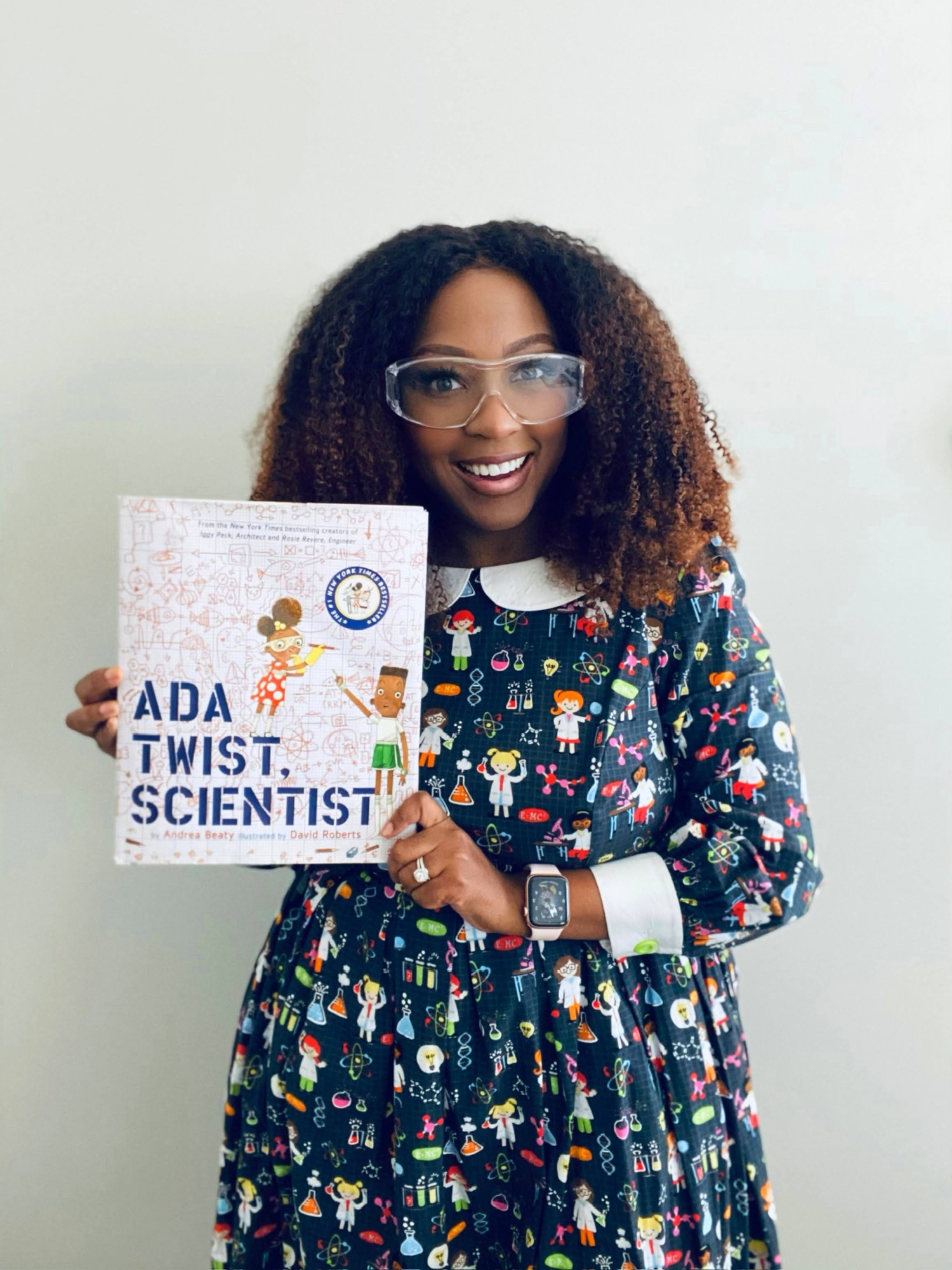 Patrice holding Ada Twist Scientist